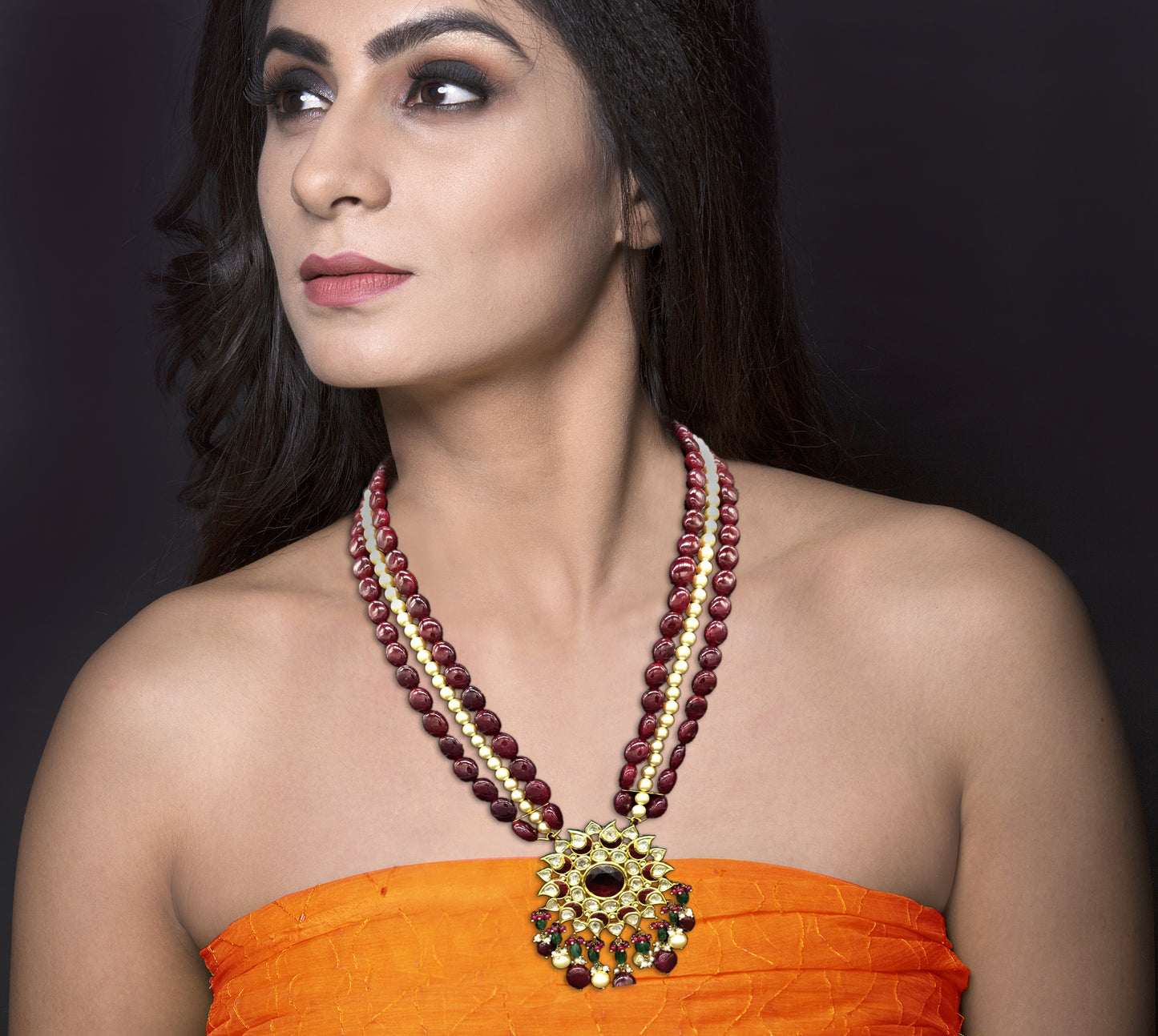 Traditional Gold and Diamond Polki rhodo-center star-shaped Pendant Set with rubies and pearls - G. K. Ratnam