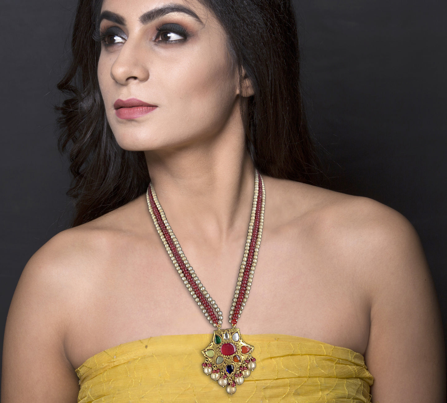 23k Gold and Diamond Polki fan-shaped Navratna Pendant With Rubies and Antiqued Freshwater Pearls - G. K. Ratnam