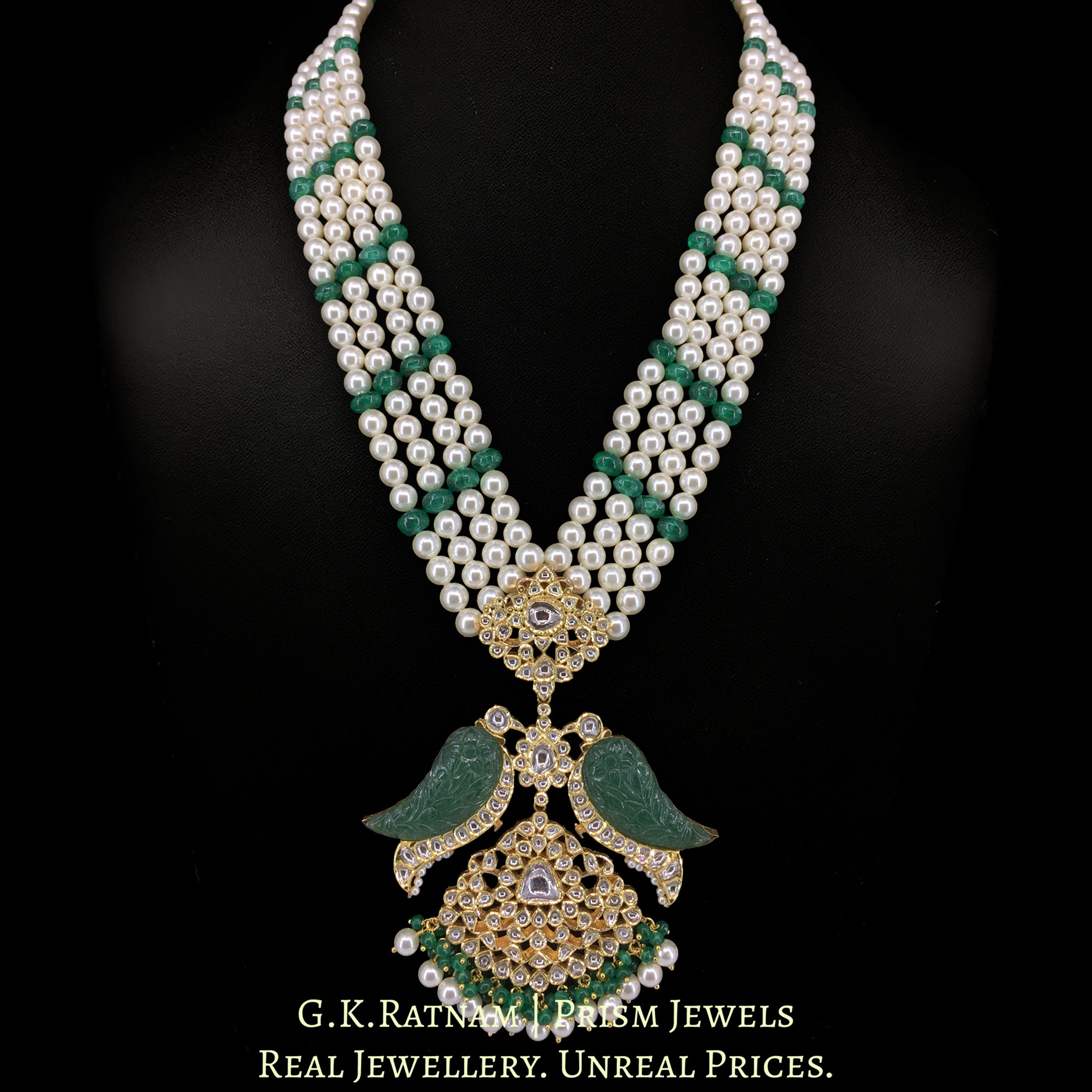 22k Gold and Diamond Polki Pendant with hand-carved emerald-green stones in Bird Motif