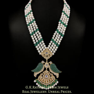 22k Gold and Diamond Polki Pendant with hand-carved emerald-green stones in Bird Motif