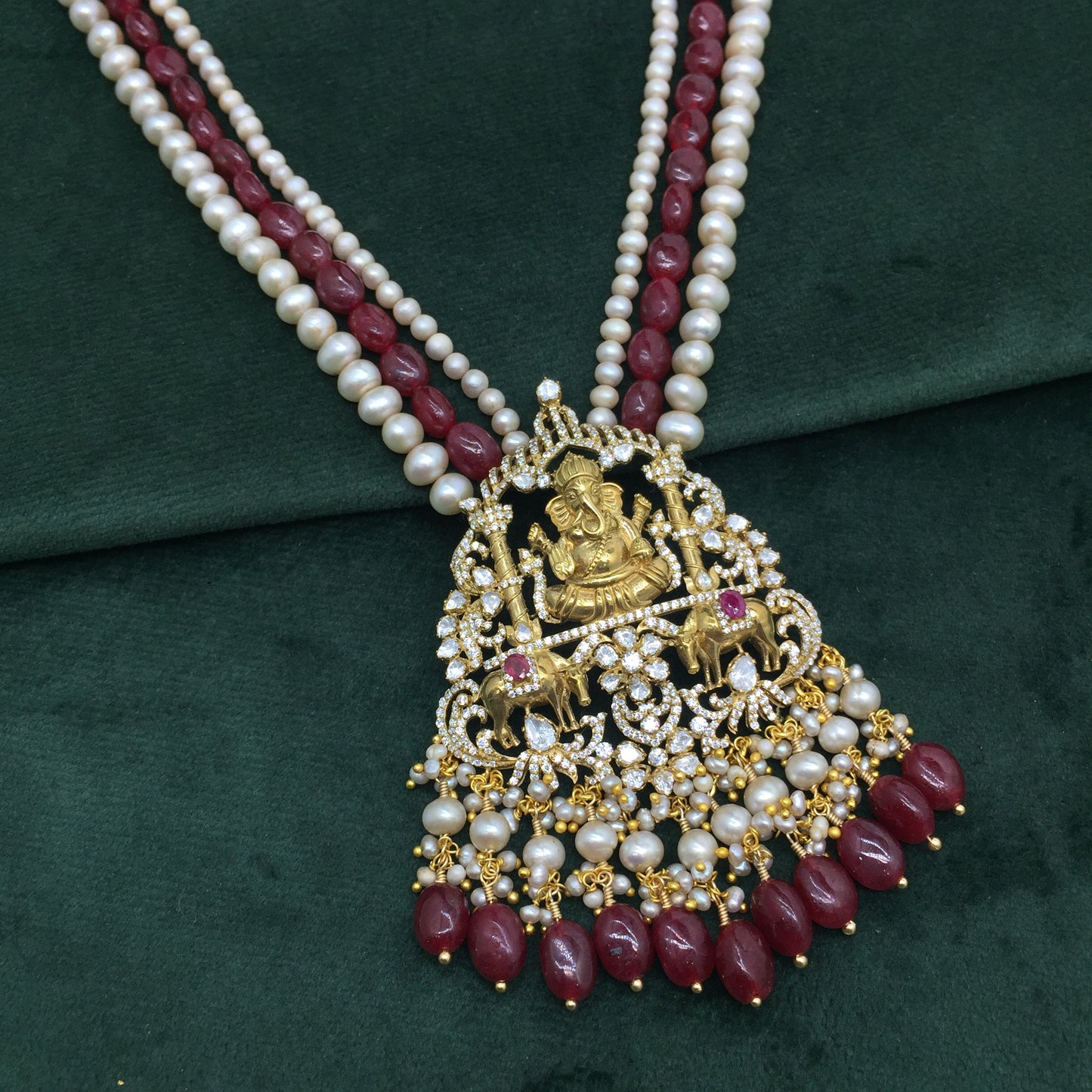 925 Silver Lord Ganesha Pendant Set enhanced with Rubies and Antiqued Freshwater Pearls