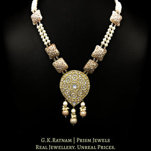 18k Gold and Diamond Polki pear-shaped Pendant strung with pearls and hand-carved golden elements