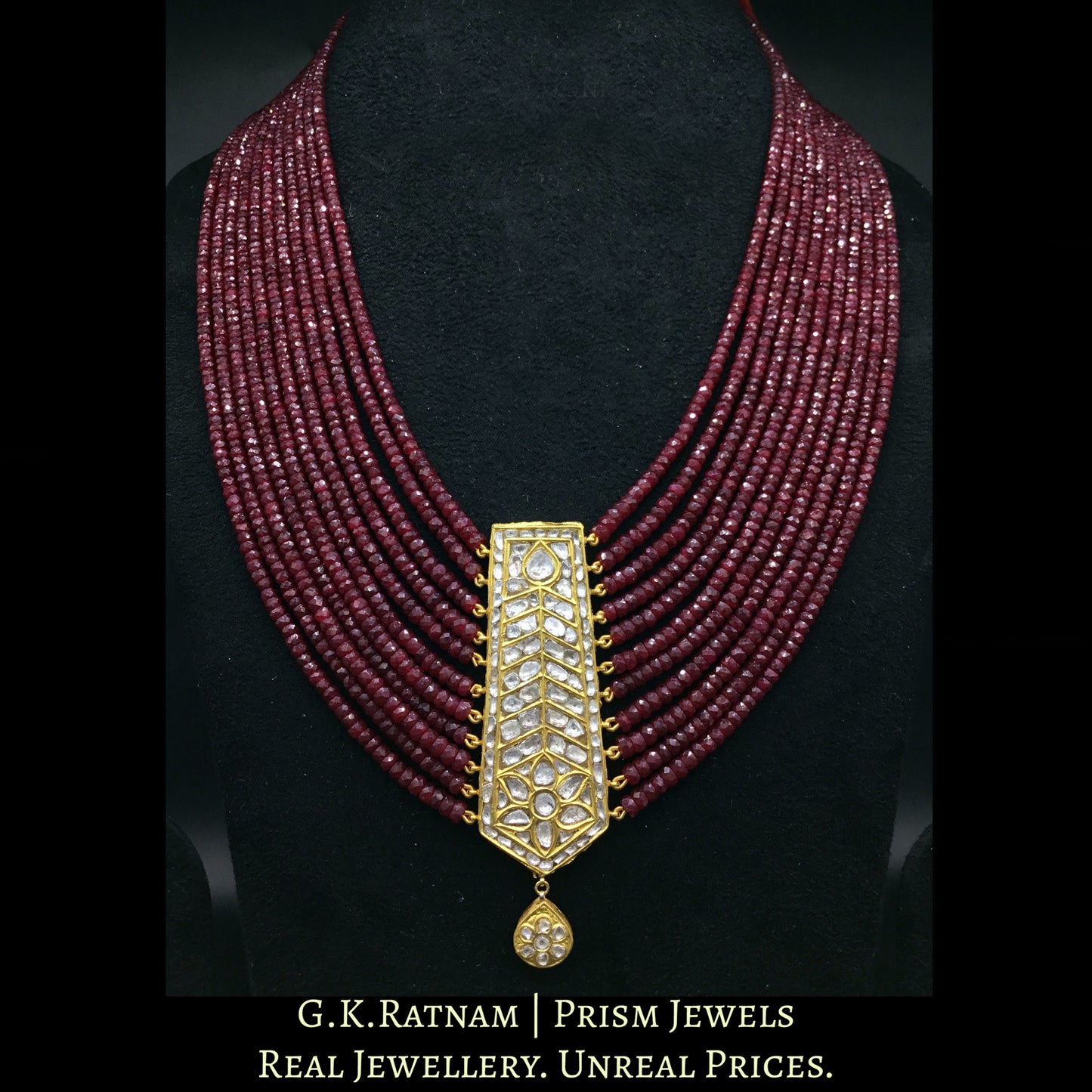23k Gold and Diamond Polki tie-shaped Pendant with Natural Rubies