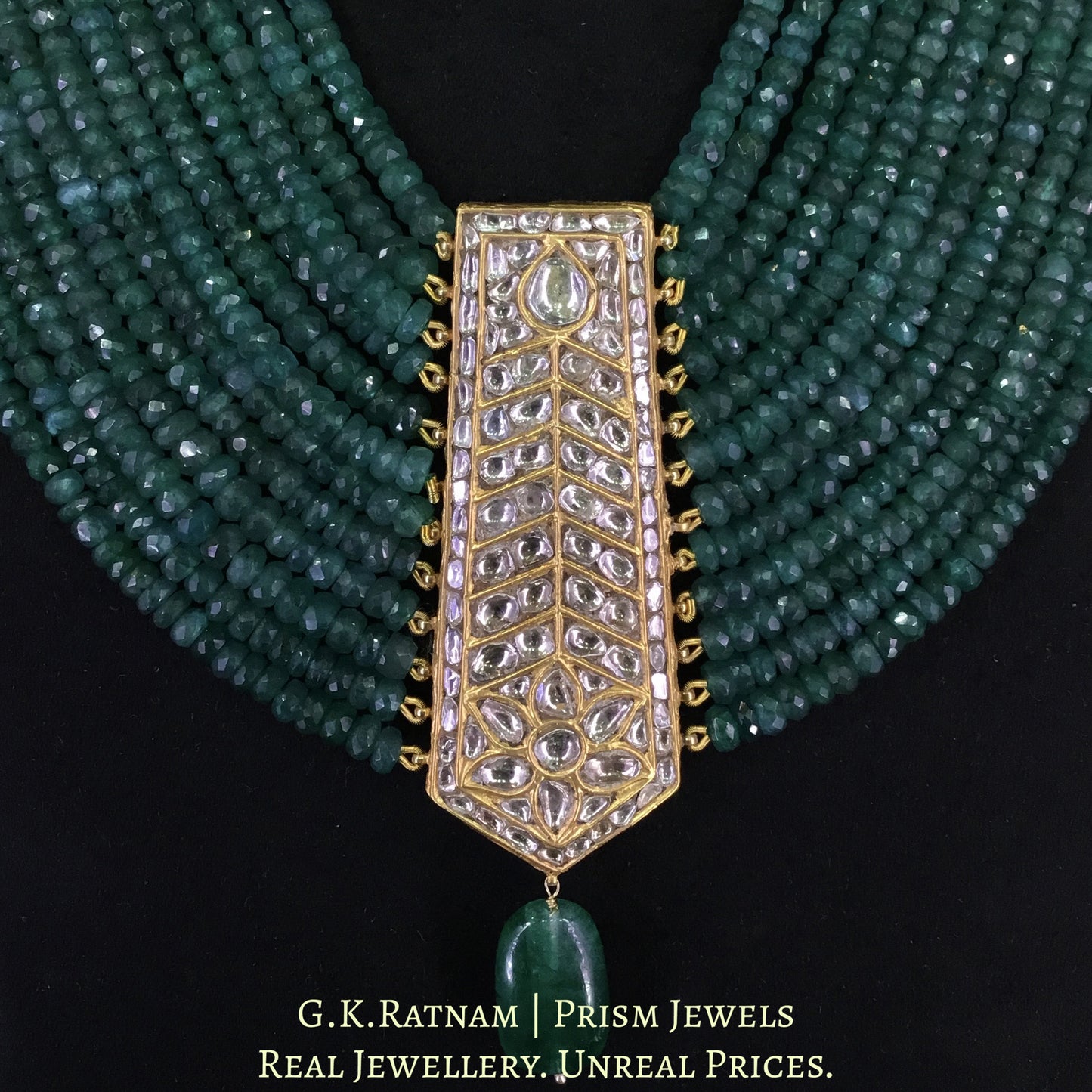 23k Gold and Diamond Polki tie-shaped Pendant with Green Beryls