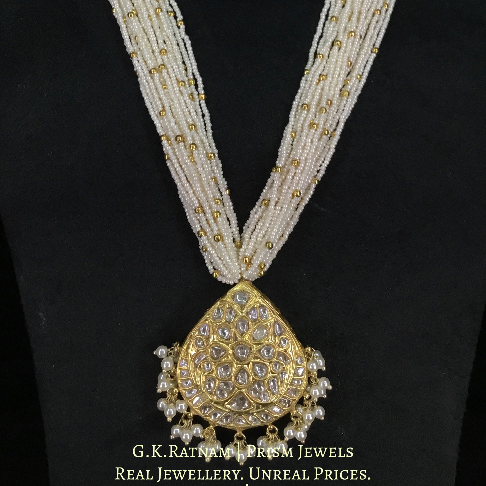 23k Gold and Diamond Polki pear-shaped Pendant with Chid Pearl Bunches