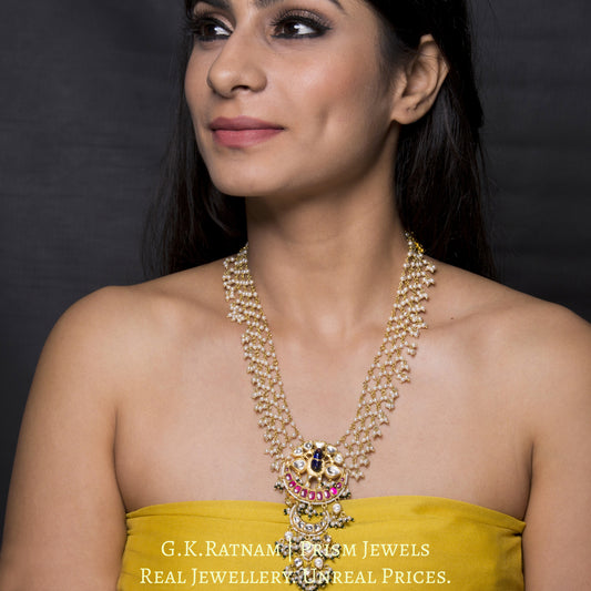 22k Gold and Diamond Polki Peacock Pendant with lustrous pearls strung in a mesh