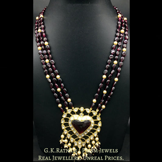 Traditional Gold and Diamond Polki heart-shaped Pendant Set with rhodolite center