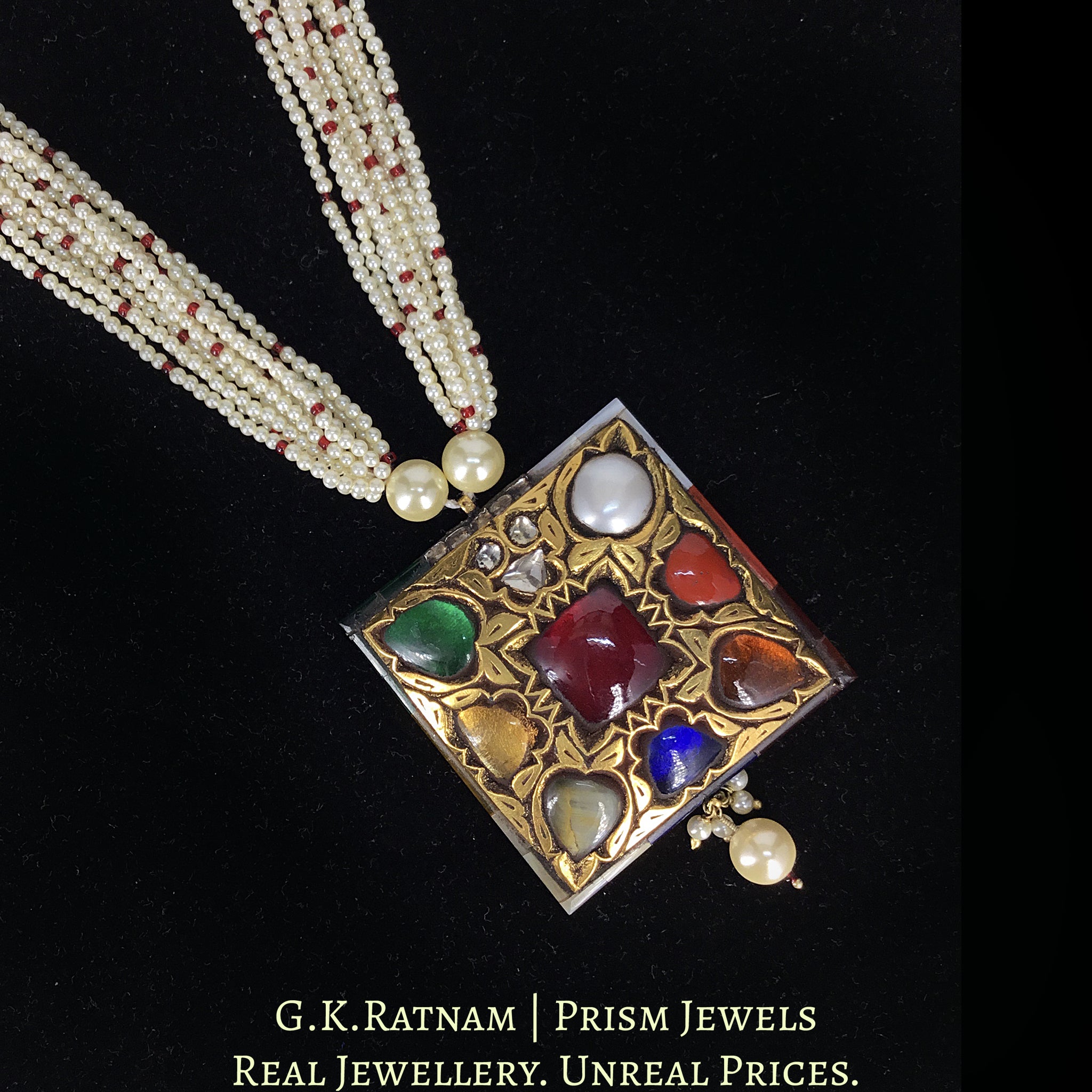 23k Gold and Diamond Polki Navratan Pendant strung in lustrous pearl bunches with a hint of red