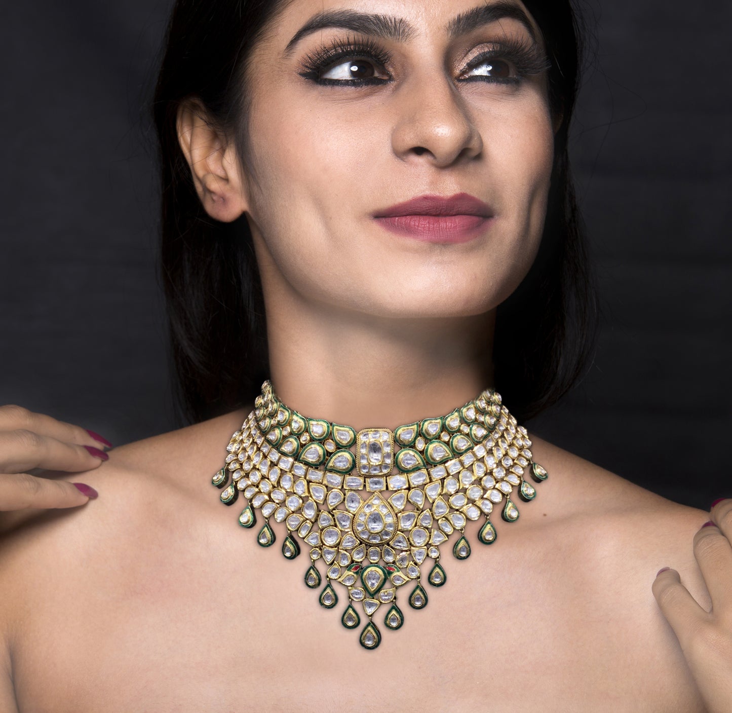 Traditional Gold and Diamond Polki Choker Necklace Set enhanced with a touch of green meenakari