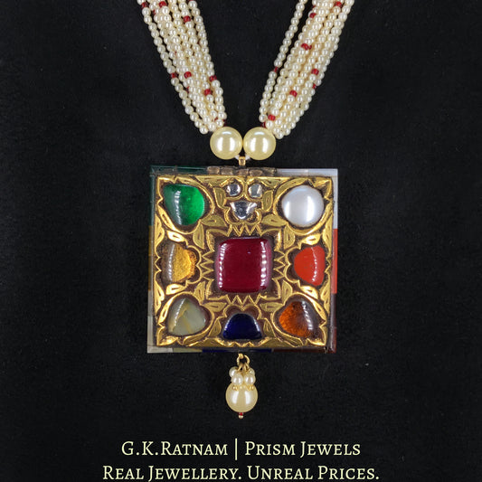 23k Gold and Diamond Polki Navratan Pendant strung in lustrous pearl bunches with a hint of red