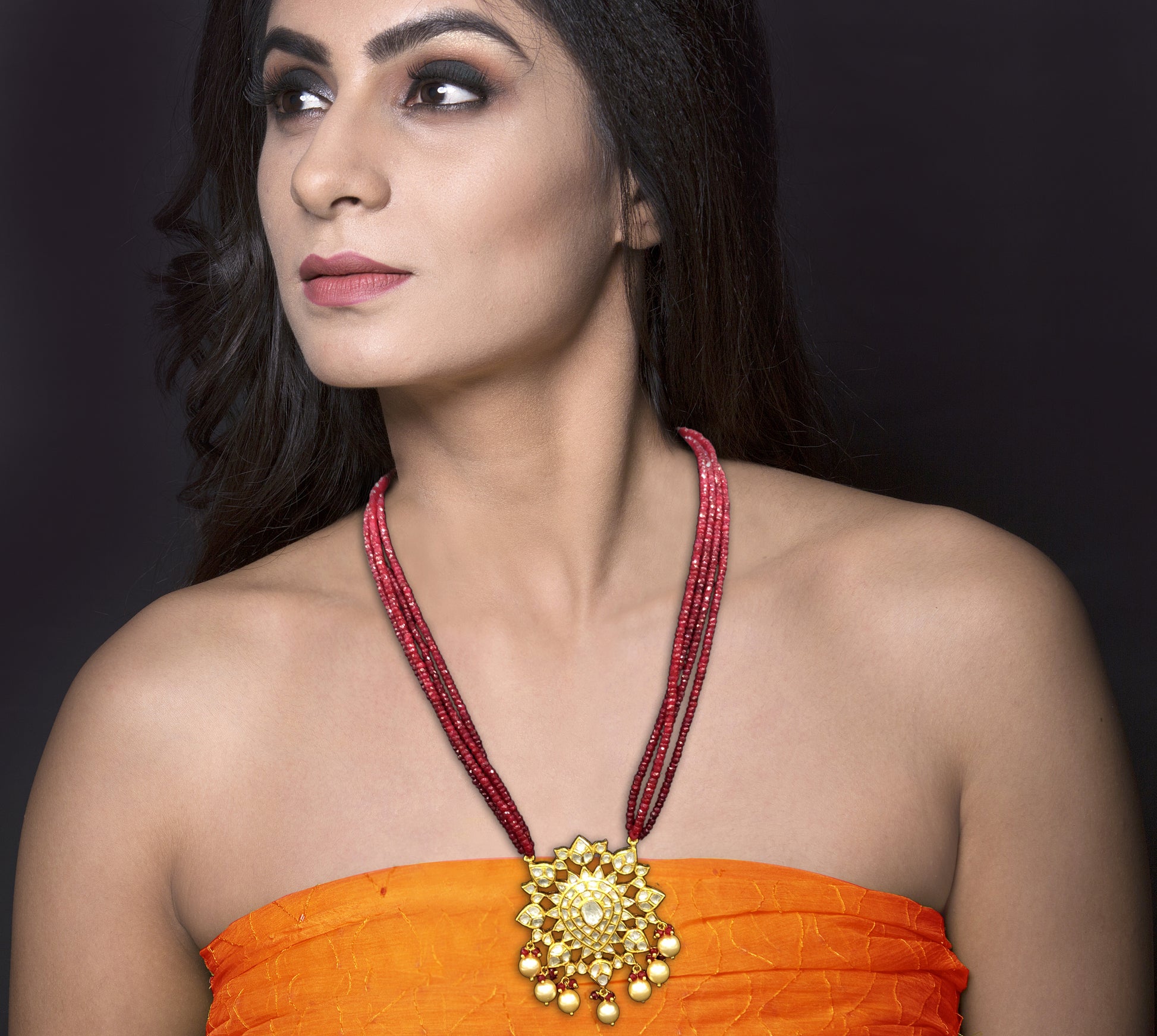 Traditional Gold and Diamond Polki star-shaped Pendant Set with Natural Ruby Beads - G. K. Ratnam