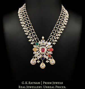 18k Gold And Diamond Polki Navratna Pendant strung with intricate pearl chains
