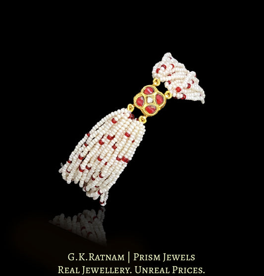 23k Gold and Diamond Polki Rakhi-cum-Bracelet with uncut surrounded by red stones