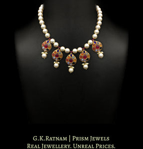23k Gold and Diamond Polki Navratna Necklace with five pear-shaped tikdas strung in shell pearls - G. K. Ratnam