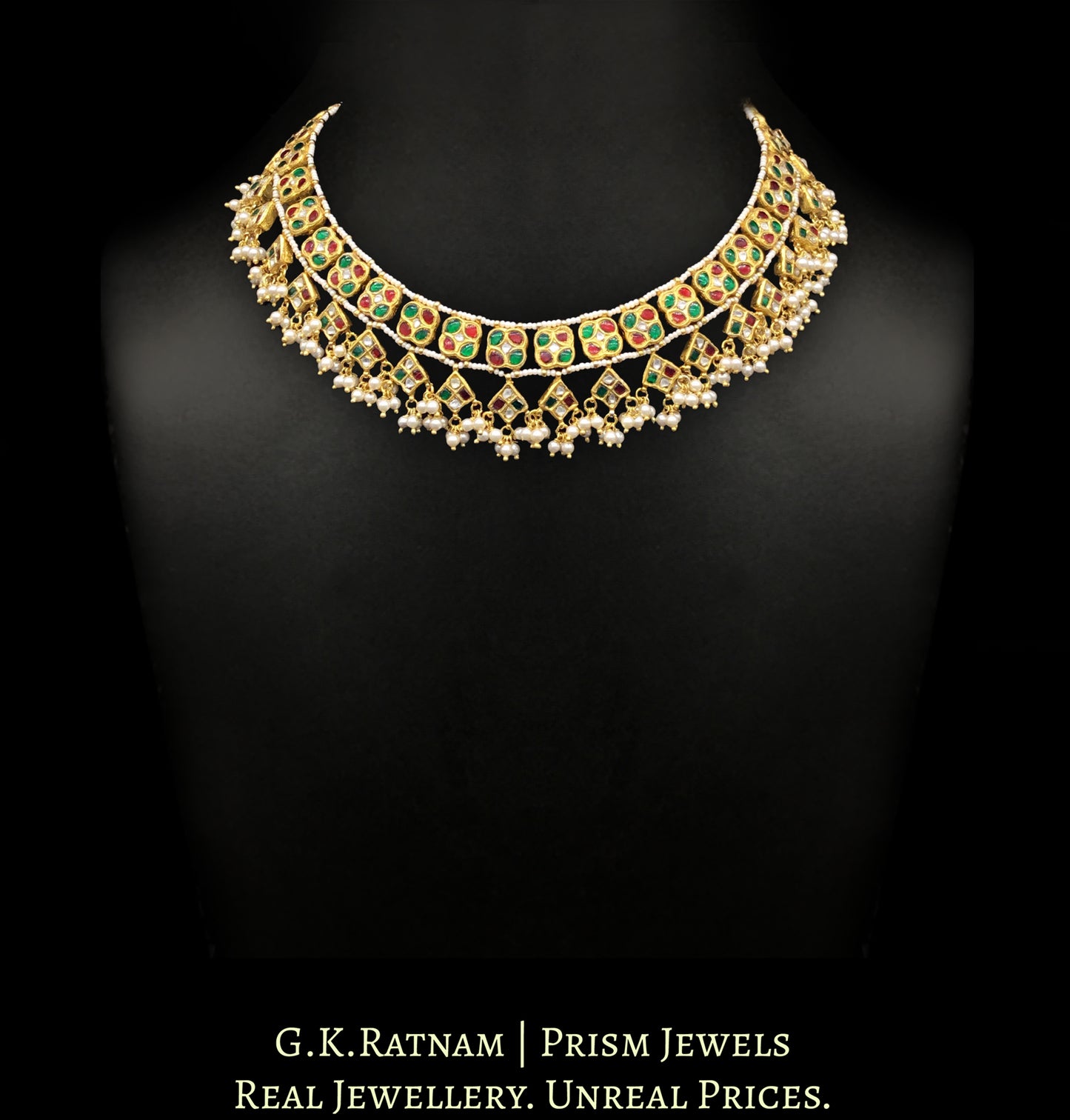 23k Gold and Diamond Polki Necklace set with ruby-red and emerald-green stones