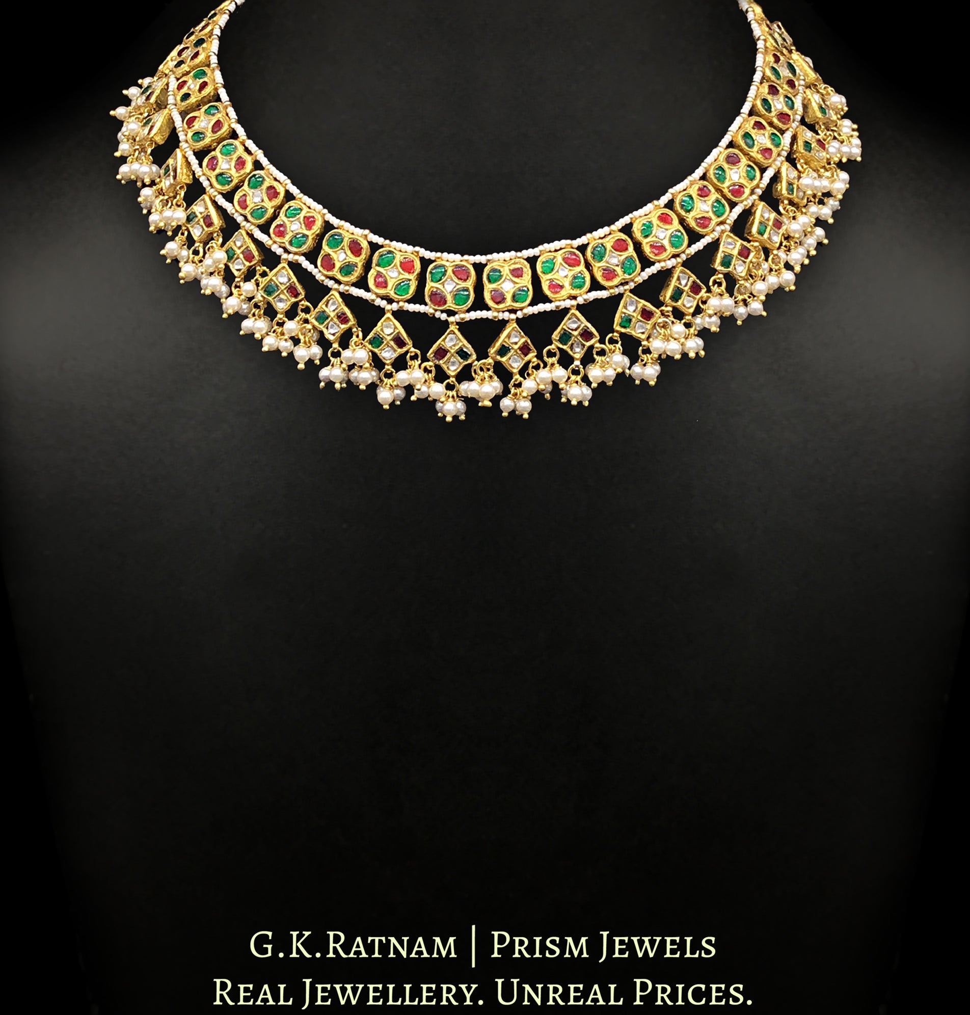23k Gold and Diamond Polki Necklace set with ruby-red and emerald-green stones