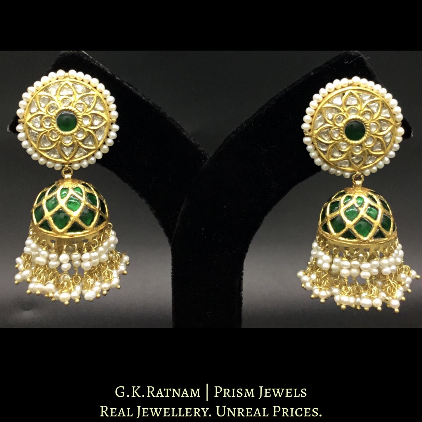 23k Gold and Diamond Polki Jhumki Earrings set with emerald-green stones and enhanced with Freshwater Pearls