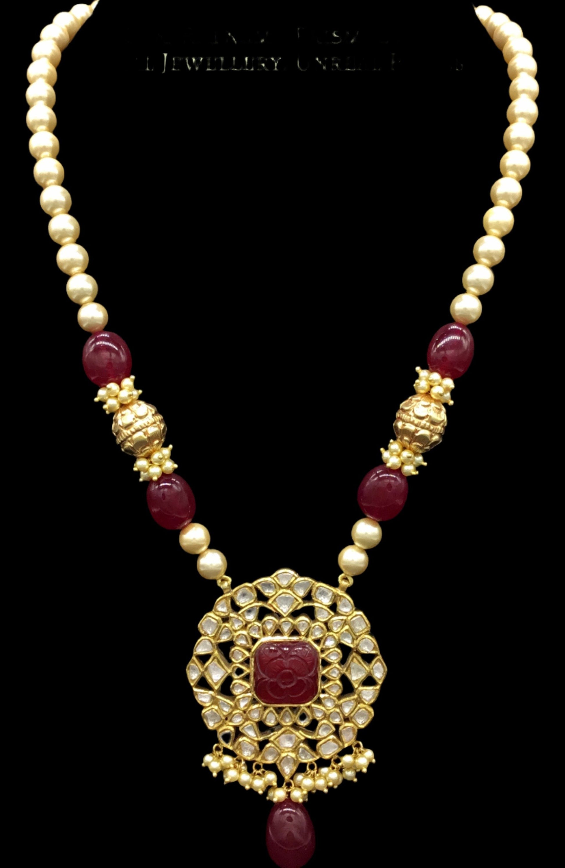 Traditional Gold and Diamond Polki carved-red-center Pendant Set with pearls and handcarved golden beads - G. K. Ratnam