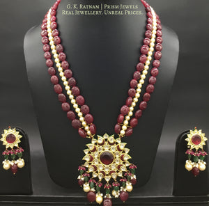 Traditional Gold and Diamond Polki rhodo-center star-shaped Pendant Set with rubies and pearls - G. K. Ratnam