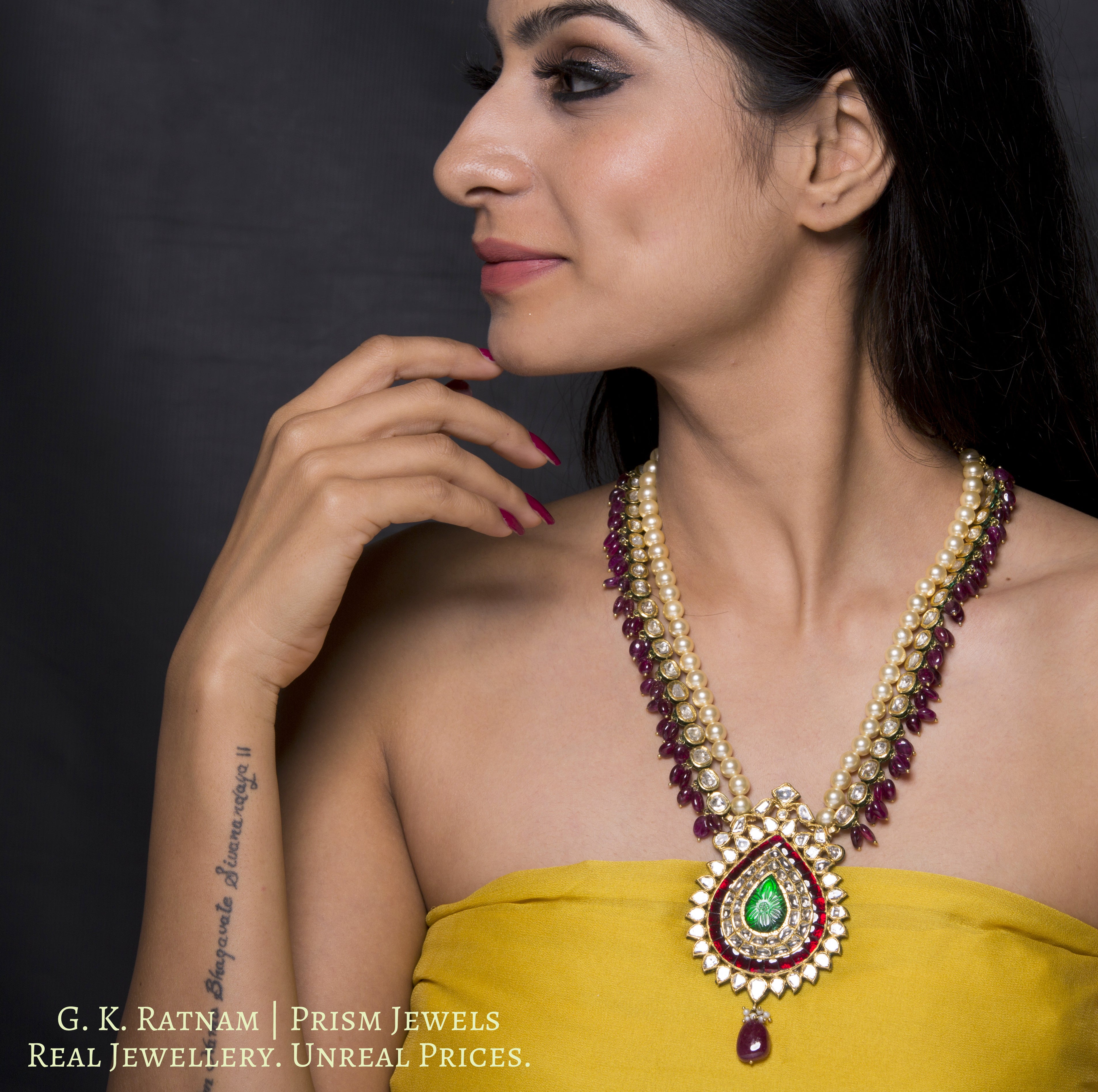 18k Gold and Diamond Polki pear-shaped Pendant strung to uncut ovals enhanced with Natural Rubies - G. K. Ratnam