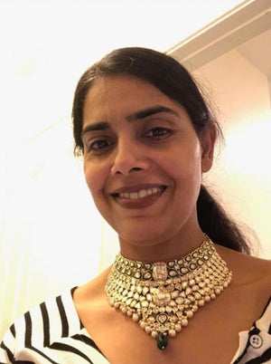 Traditional Gold and Diamond Polki Choker Necklace Set enhanced with a touch of green meenakari